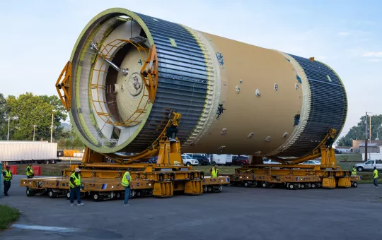 NASA space transport hardware (nasa.gov/Fred Deaton - 2019.07.09). Liquid oxygen (LOX) tank was moved from Pegasus barge to the west test area for placement in test stand.