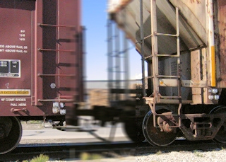 Railroad cars on a track.