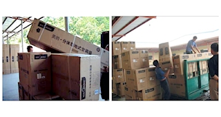Midea packages being unloaded.
