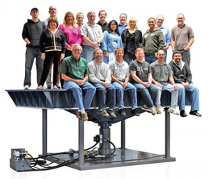 People on top of 28000 Vibration Test System.